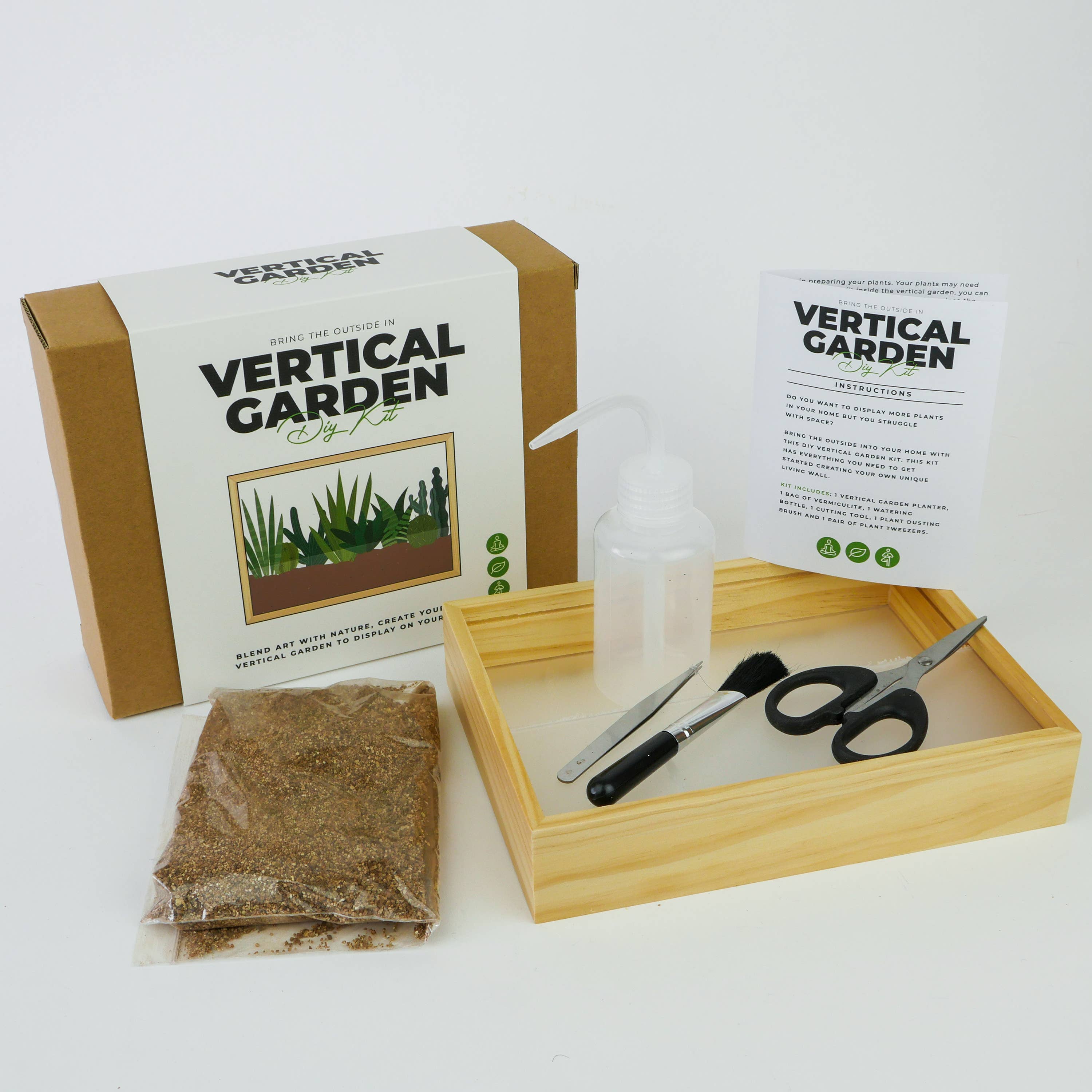 Vertical Garden kit contents with tools and vermiculite on white background