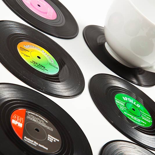 Vinyl Coasters set of six record designs close up with white cup