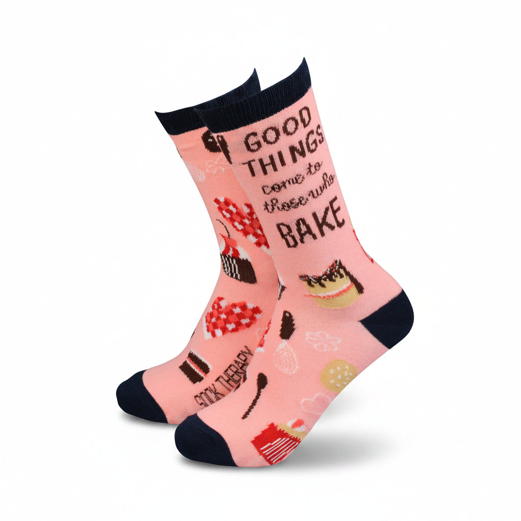 Pink women’s bamboo socks with baking illustrations and the phrase “Good things come to those who bake” in bold lettering.
