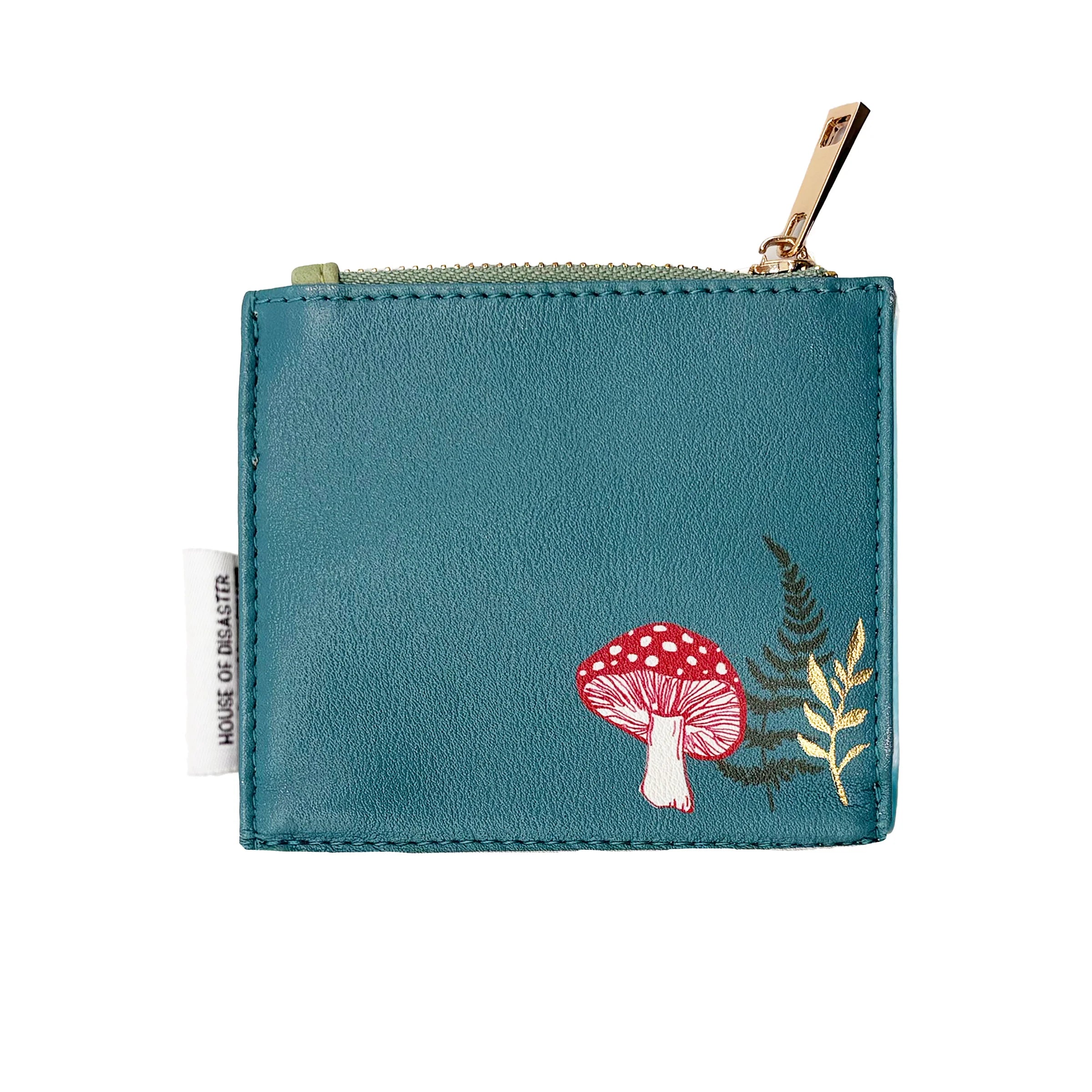 Back of hedgehog purse with mushroom and fern design
