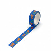 Roll of blue tape with cow pattern on a white background