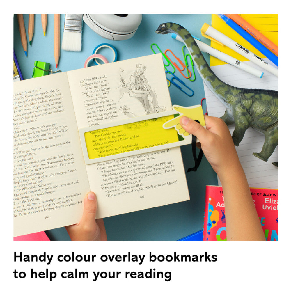 Yellow reading aid bookmark on a book at a colourful school desk