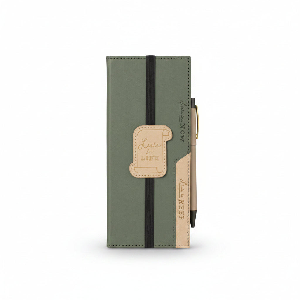 Green Lists For Life journal on a wooden desk with a pen and coffee