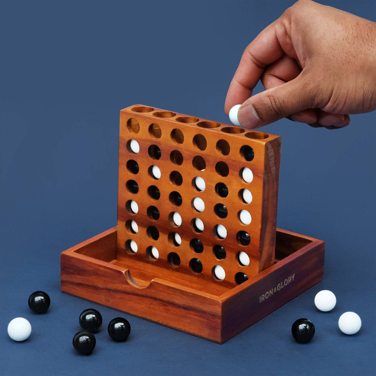 Iron & Glory Four wooden four in a row game with black and white glass marbles