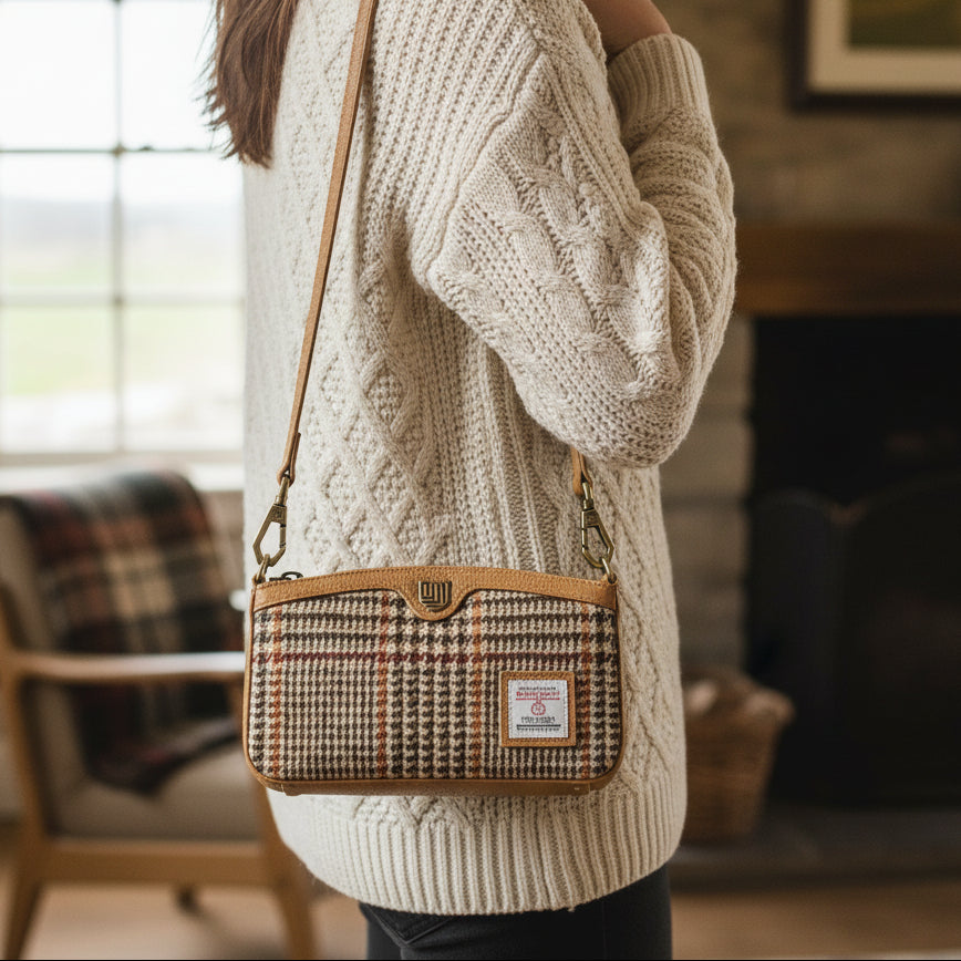 Ailsa beige dogtooth Harris Tweed purse worn as crossbody lifestyle