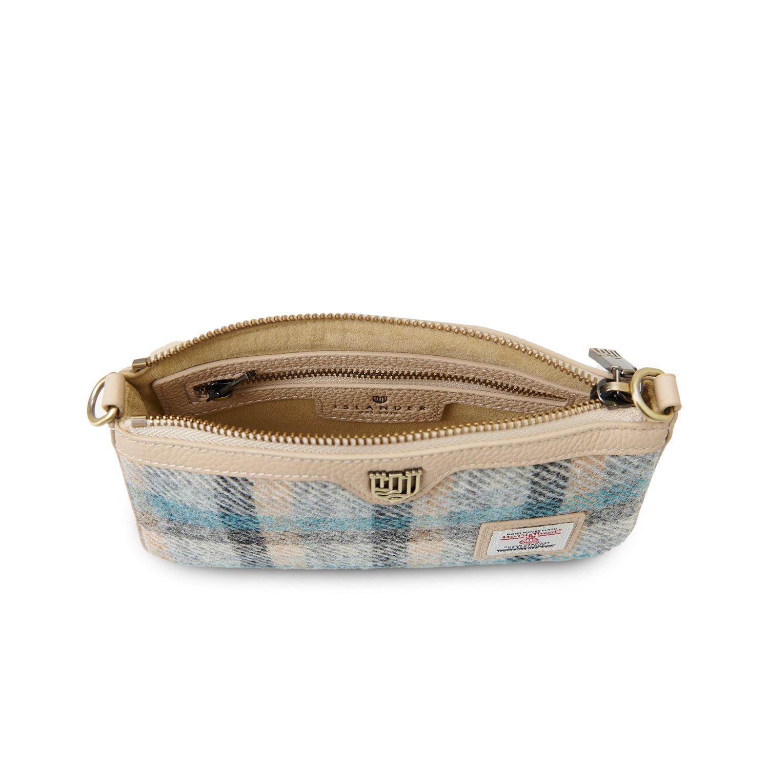 Ailsa Islander tartan purse angled view as clutch on white background