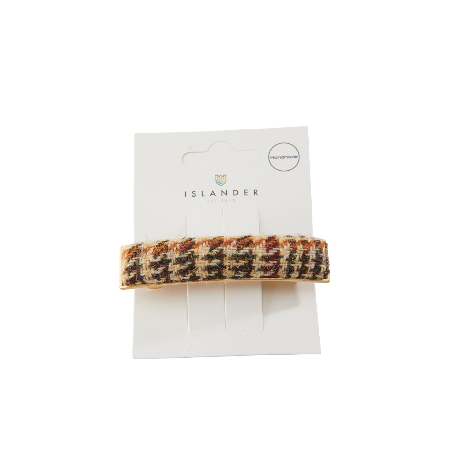 Harris Tweed beige dogtooth hair clip on Islander branded packaging card
