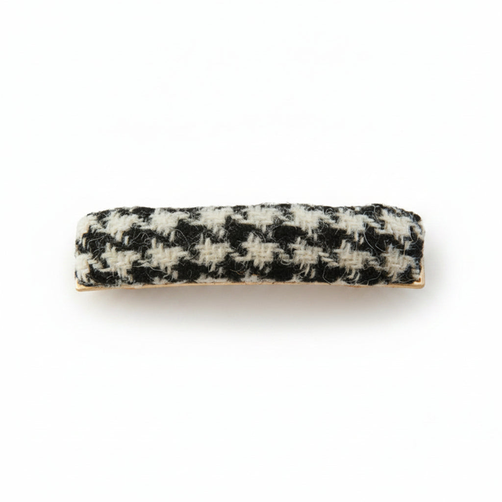 Black and white dogtooth Harris Tweed barrette clip on white background