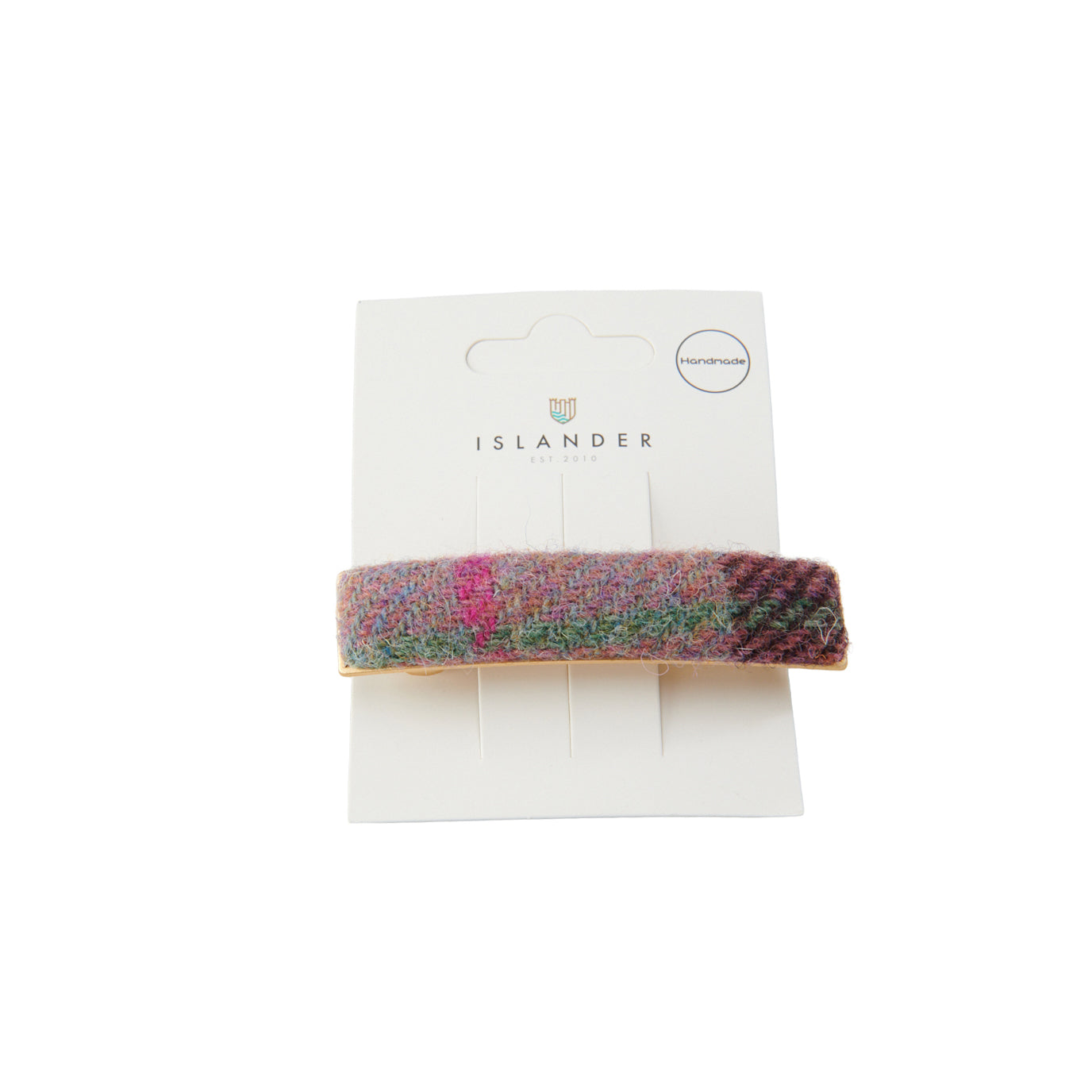 Harris Tweed pink-green tartan hair clip on Islander branded packaging card