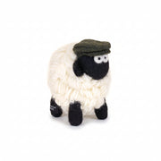 Handmade wool mountain sheep collectible wearing a green flat cap