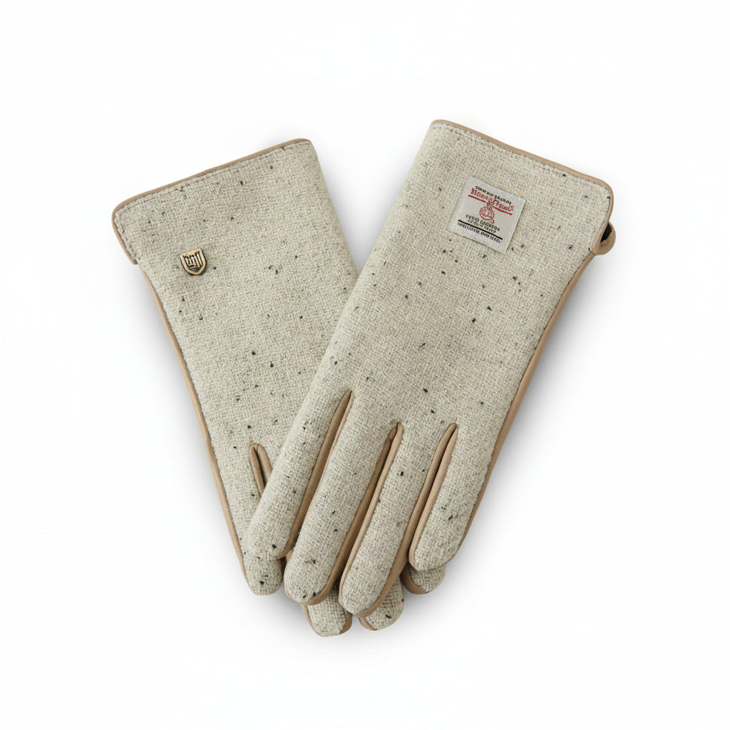 Harris Tweed cream gloves worn holding steaming mug outdoors in Scottish countryside