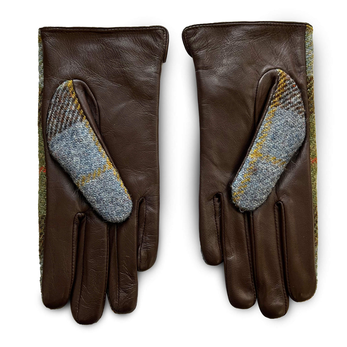 Back view of gloves with brown leather palms and wool tartan thumbs in soft blue and gold tones.