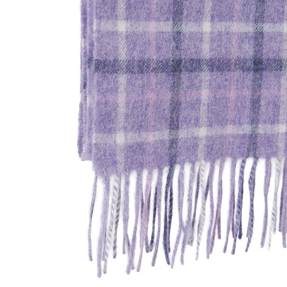 Fringed end of the lilac tartan lambswool scarf