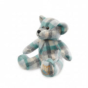 Lambswool teddy teal Islander tartan angled view on white background.