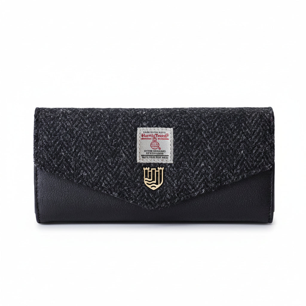 Black herringbone Harris Tweed clasp purse front view on white background
