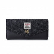 Black herringbone Harris Tweed clasp purse front view on white background
