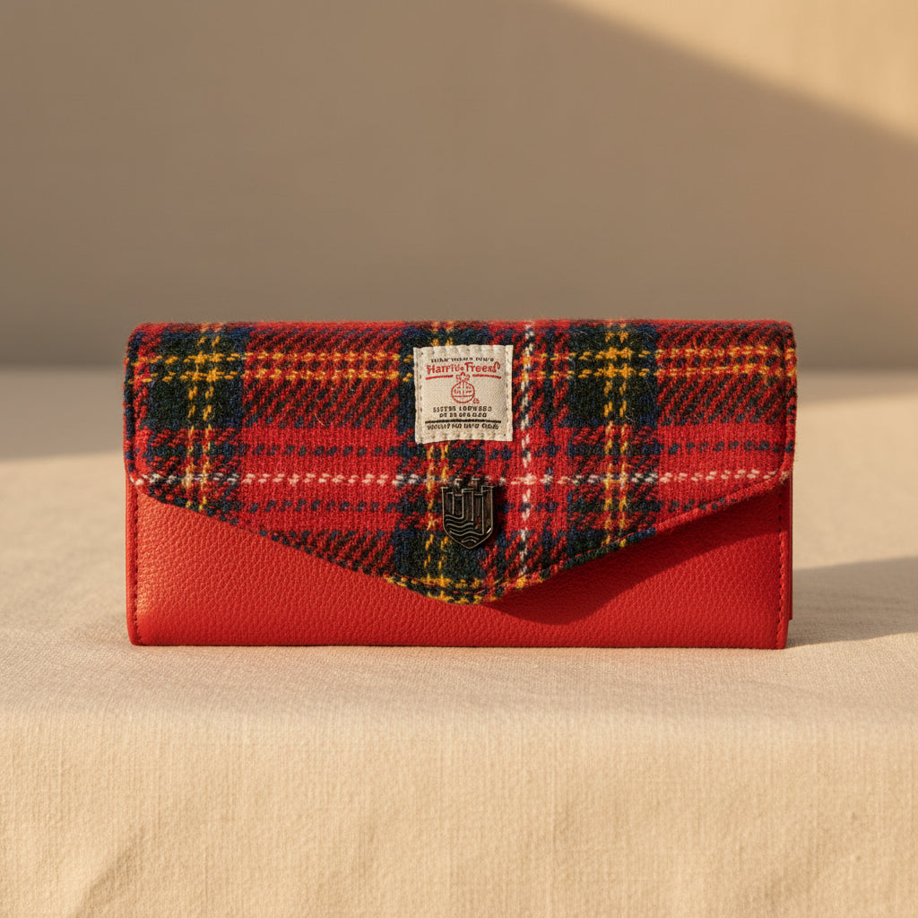 Red clutch bag with plaid pattern on a white background