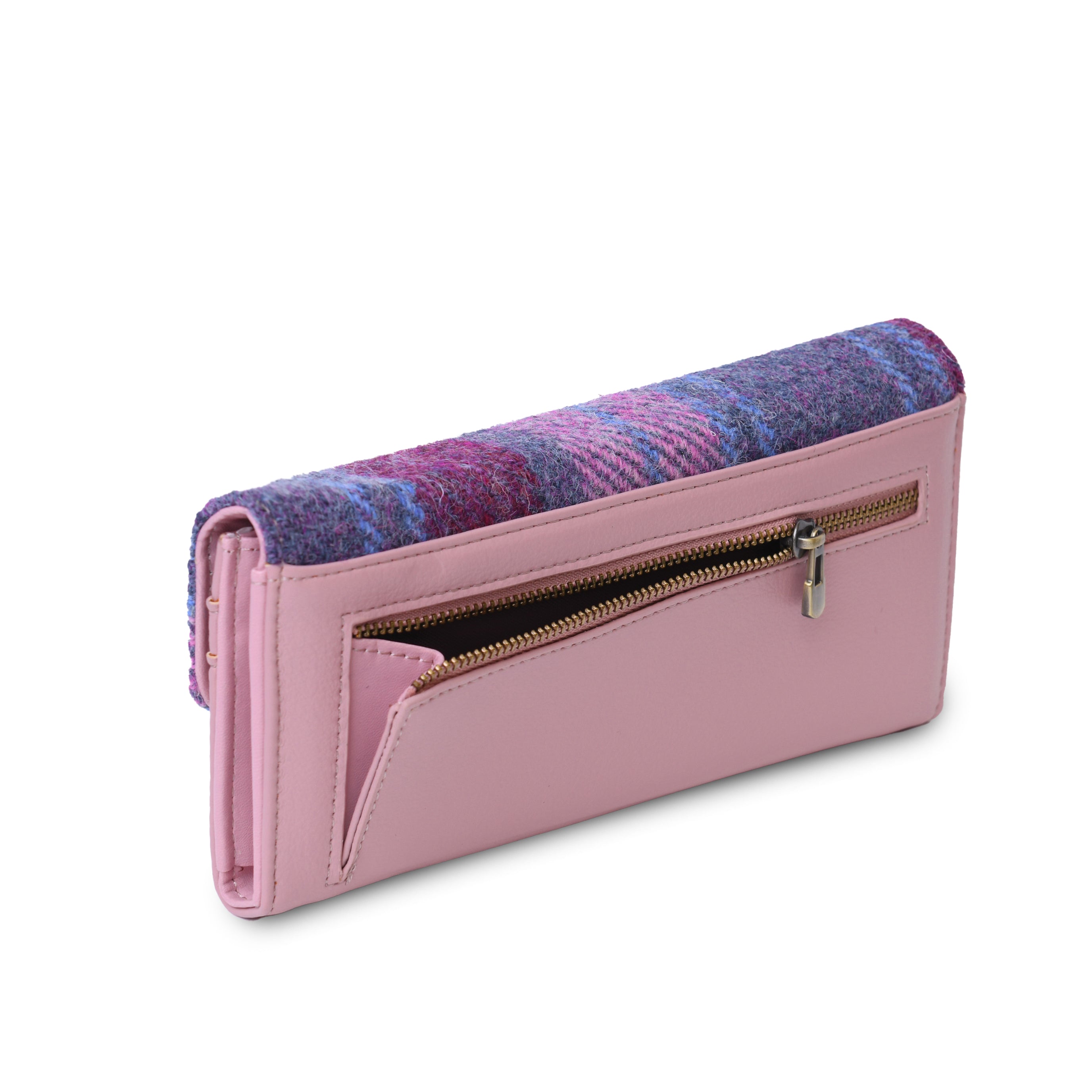 Side view of the pink clasp purse showing the zip along the base