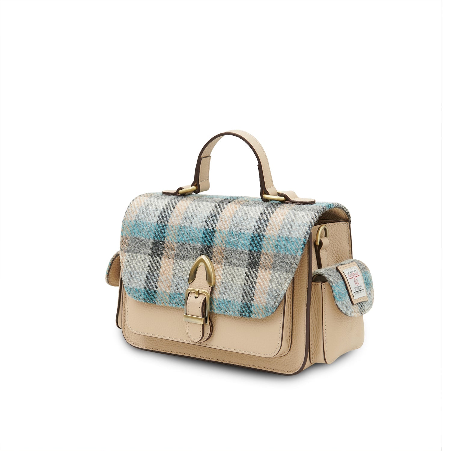 Melrose crossbody showing side pocket and Harris Tweed label on white background