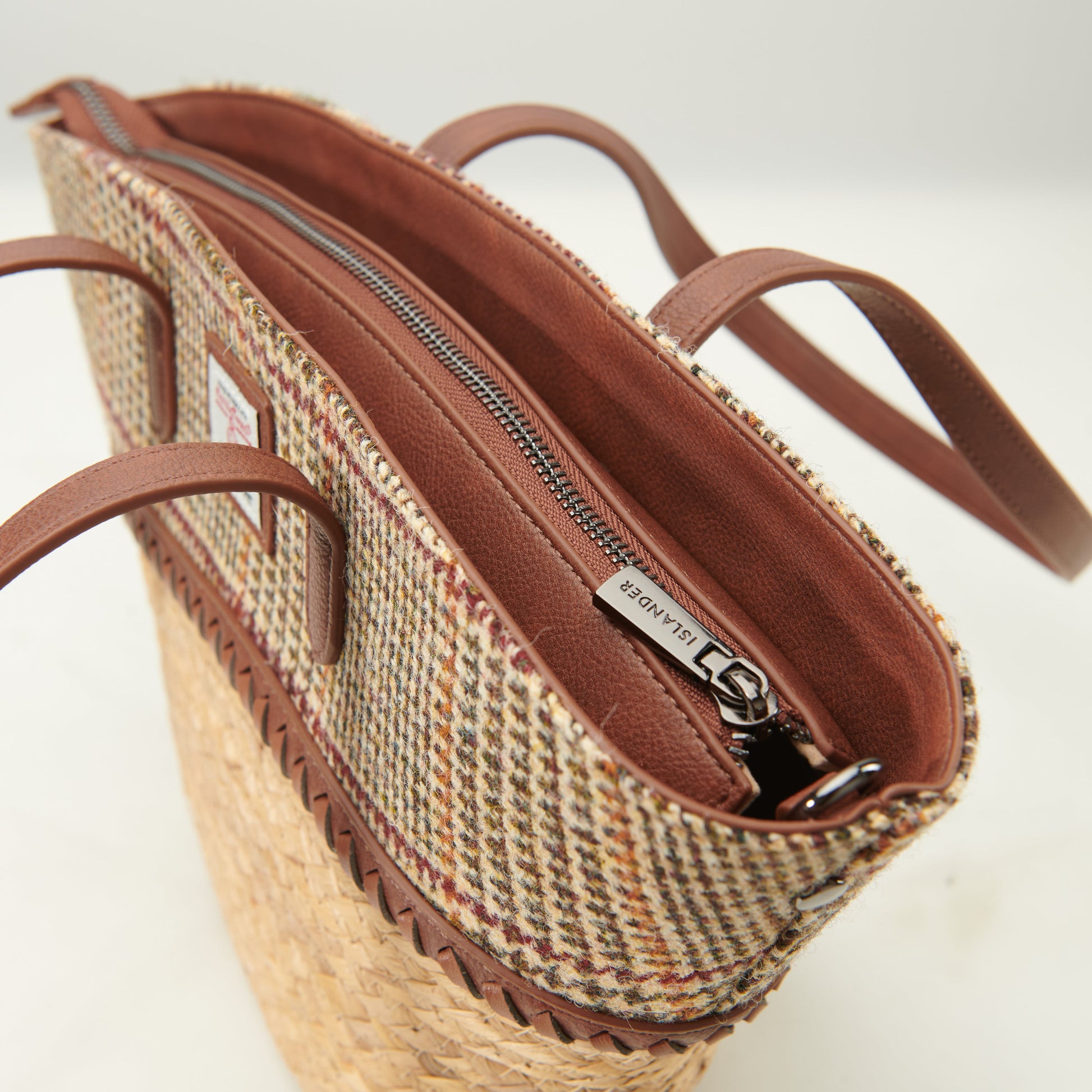 Inside the basket bag showing the lined interior and zip closure