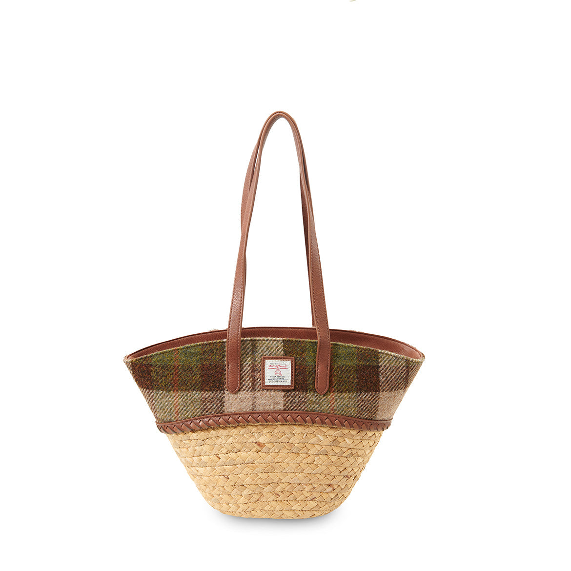 Woven straw basket bag with a chestnut tartan Harris Tweed panel and leather handles