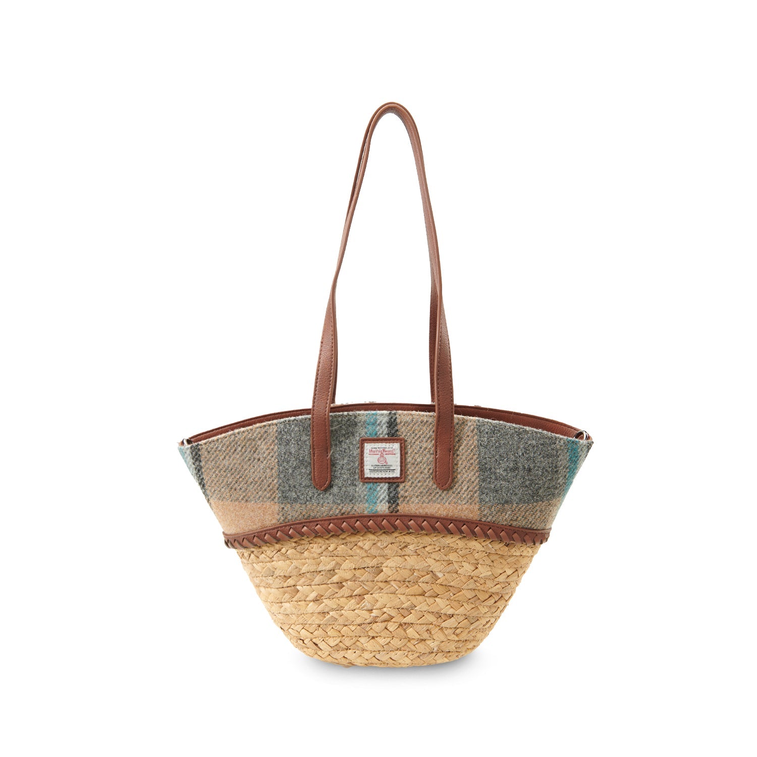 Woven straw basket bag with an Islander check Harris Tweed panel and leather handles