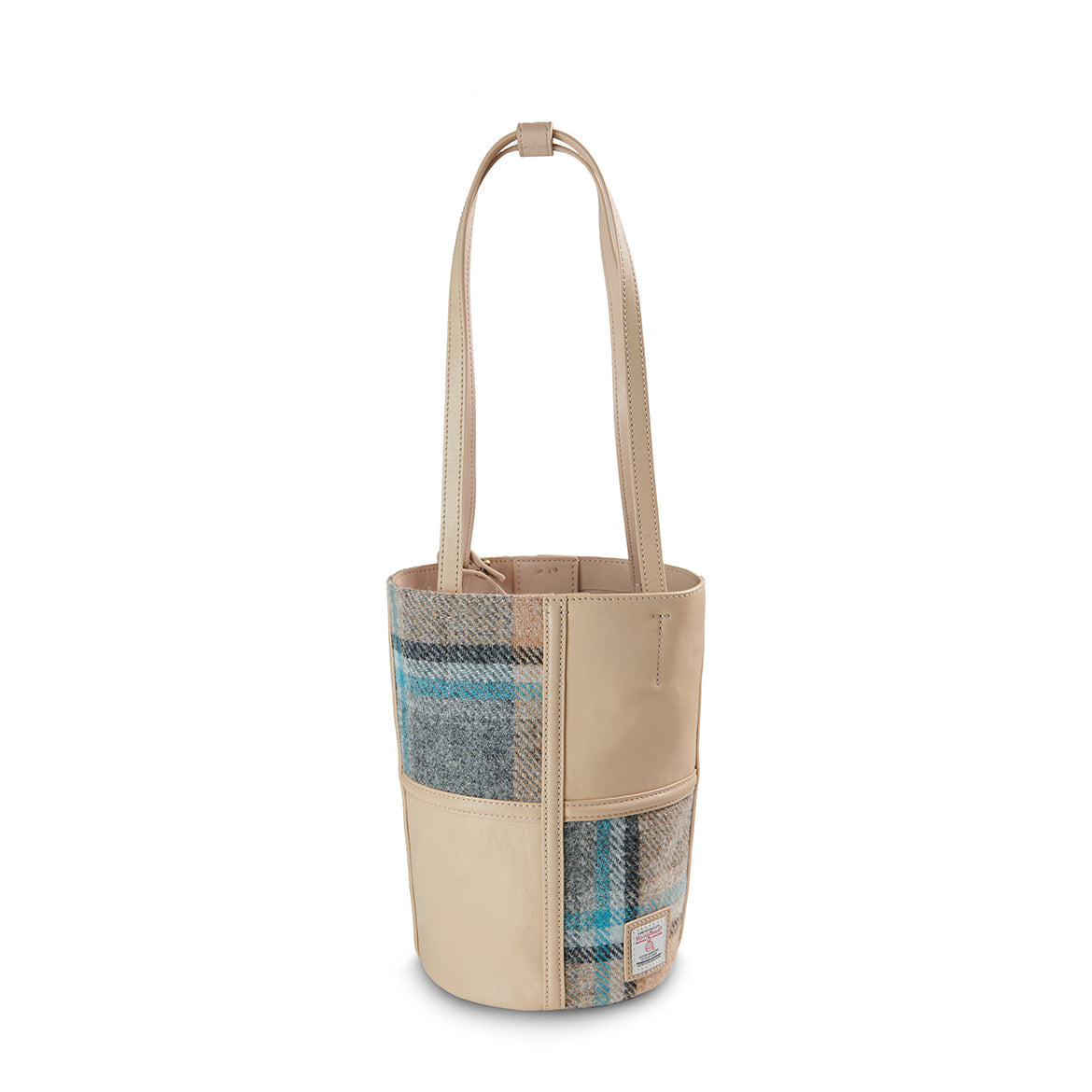 Orlagh check bucket bag showing Harris Tweed label on white background