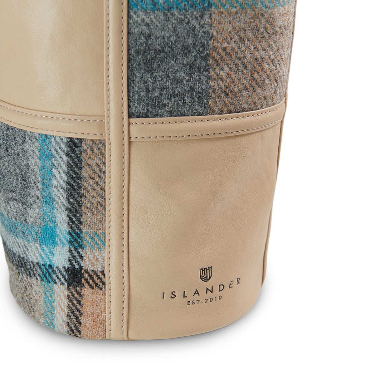 Orlagh check bucket bag side view with phone pouch on white background