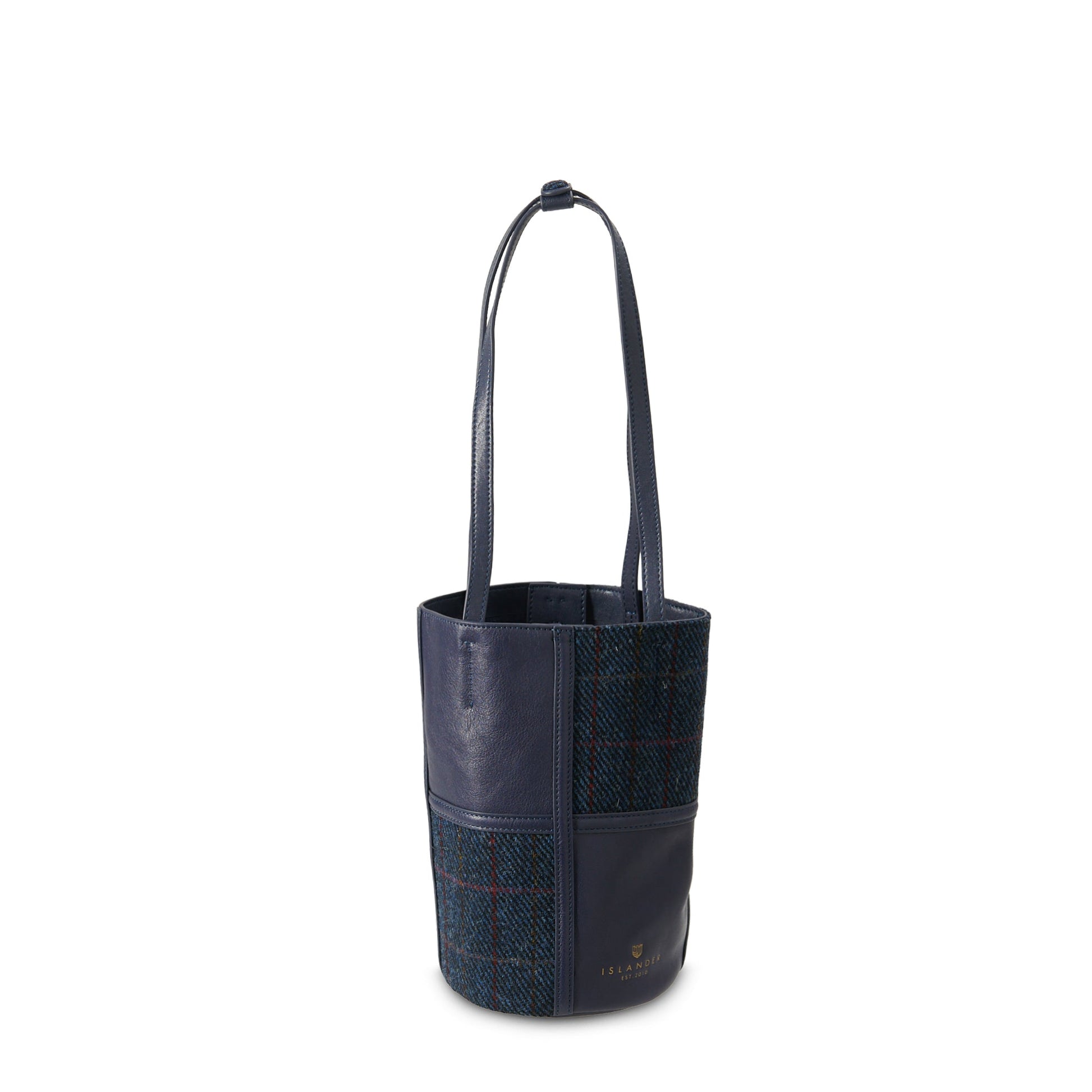Navy over-check bucket bag showing tweed pattern detail on white background