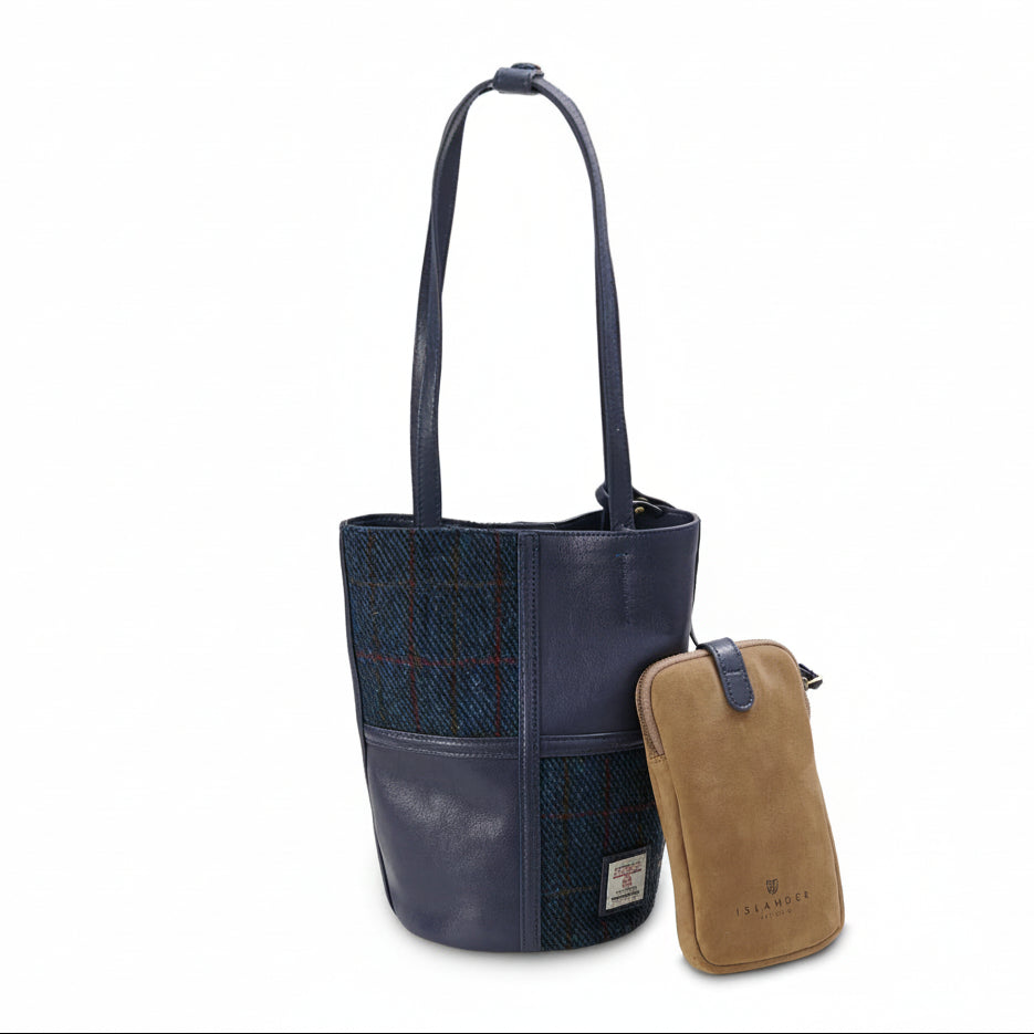 Navy over-check Harris Tweed bucket bag front view with phone pouch