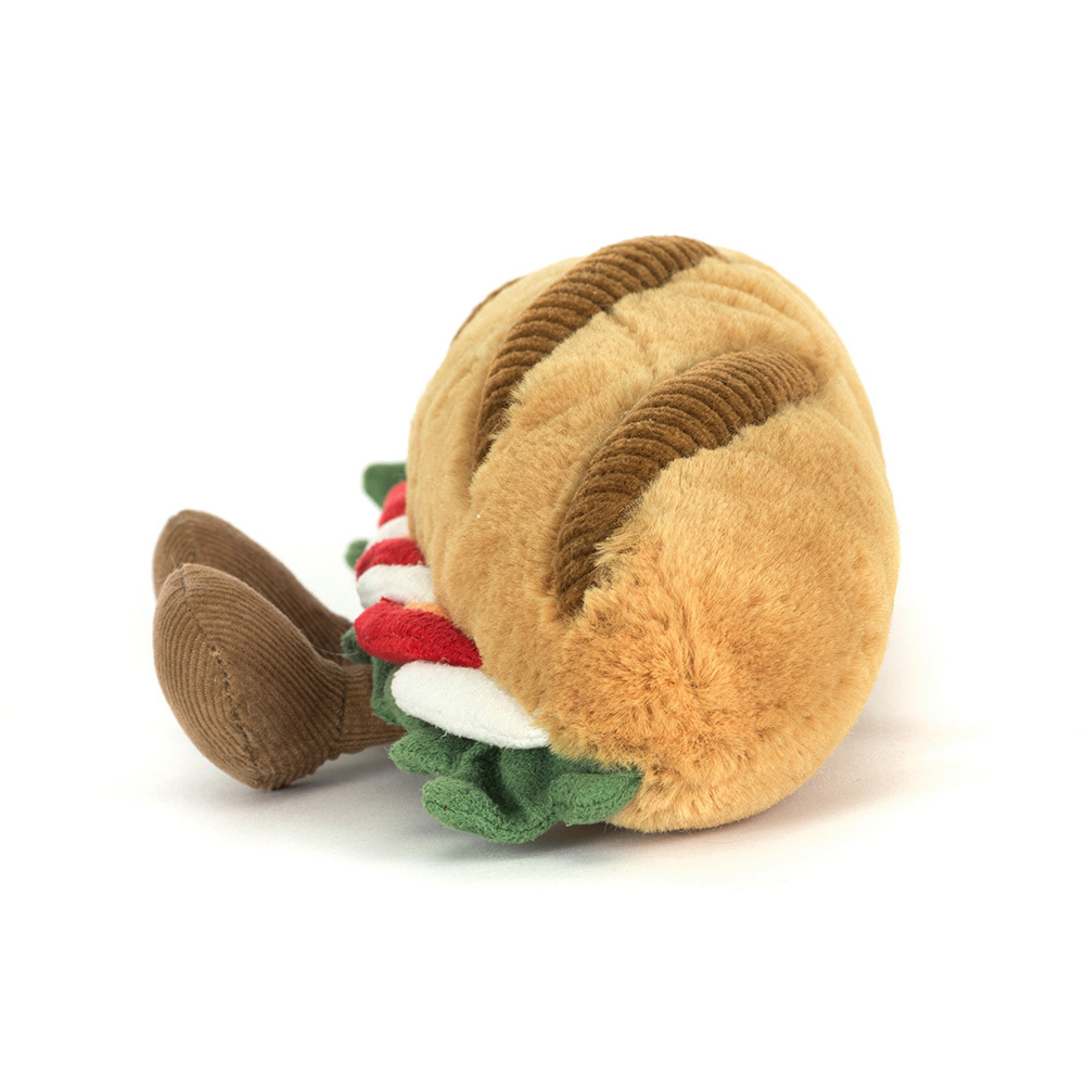 Jellycat Baguette end view showing tomato and basil filling detail