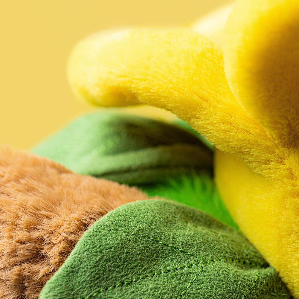 Close-up of soft plush fabric texture on daffodil bear costume