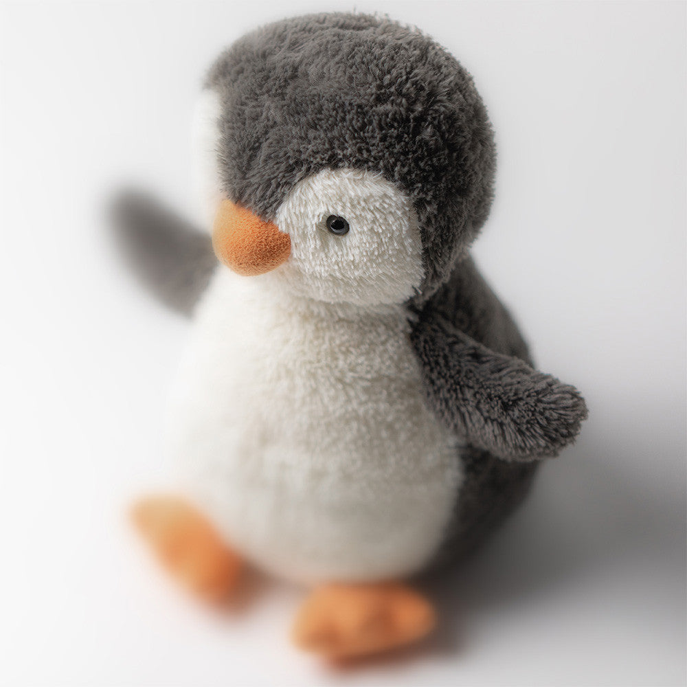 Peanut Penguin Medium soft toy angled view on white background