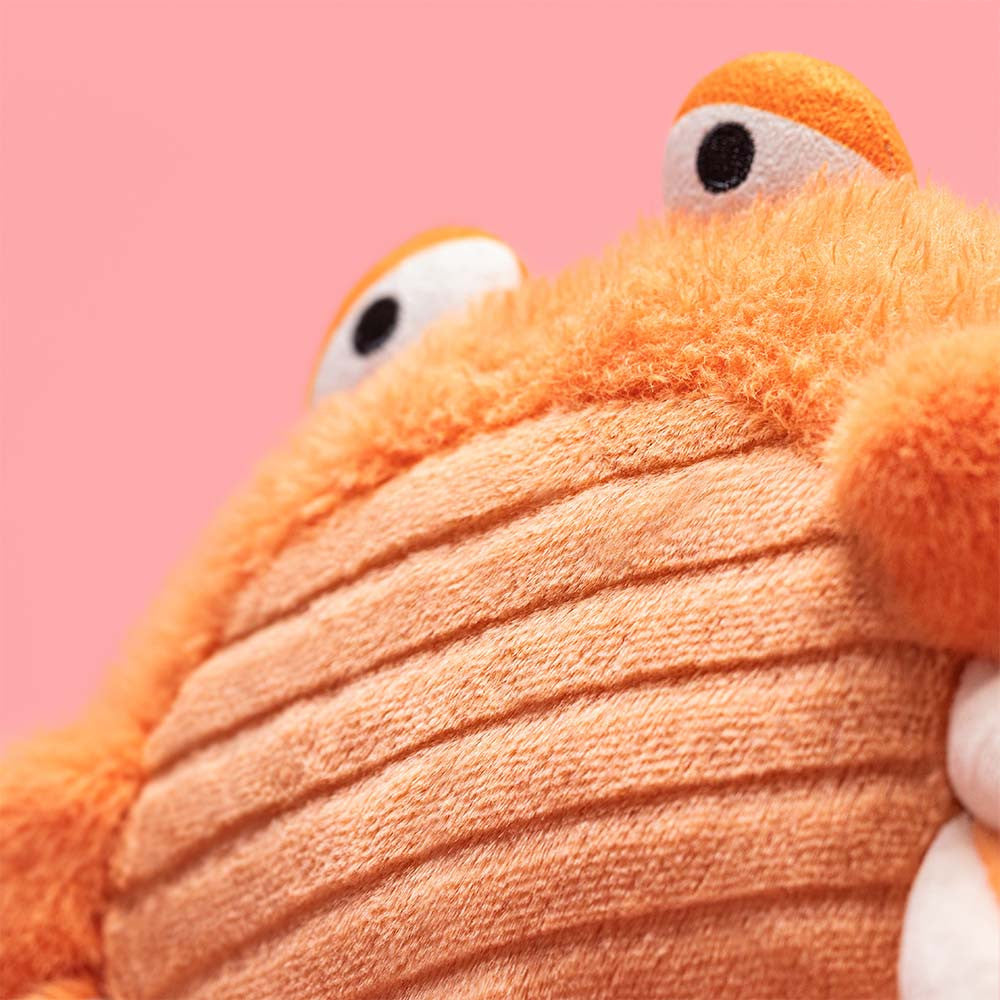 Jellycat Pinchsnap Crab plush angled view showing soft shell and claws