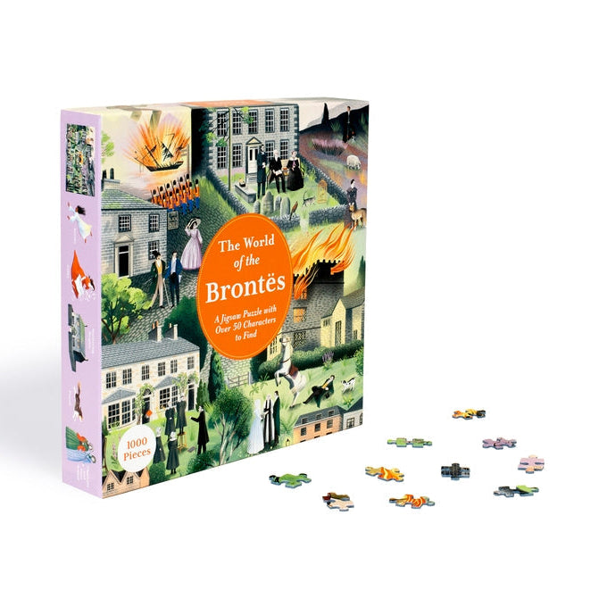 World of the Brontës jigsaw box standing upright with scattered pieces on white