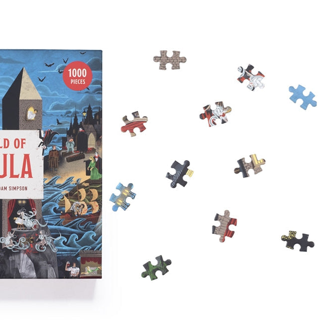 World of Dracula jigsaw box front with loose pieces on a white background