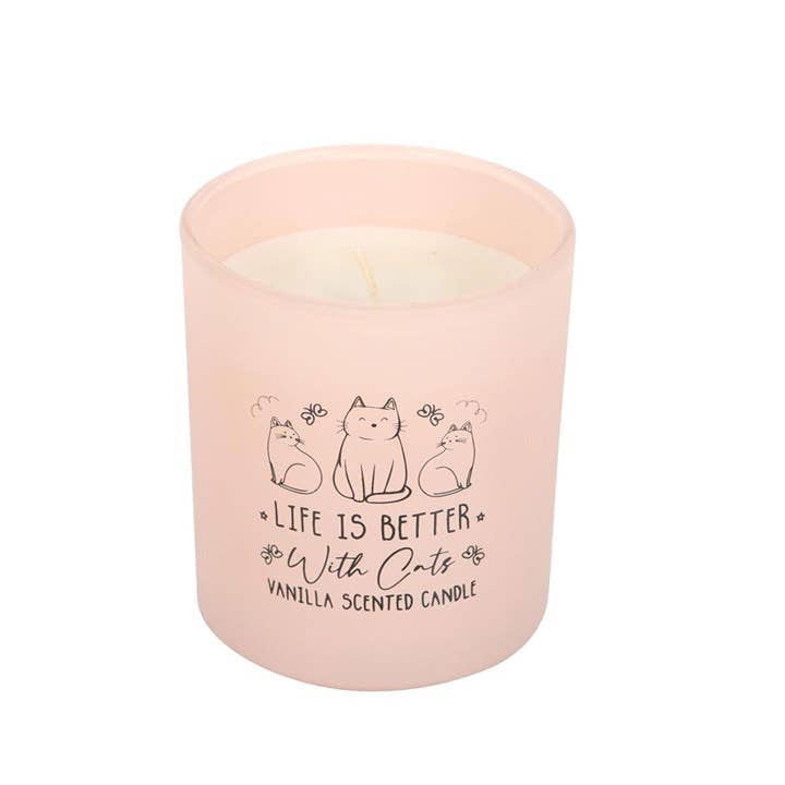 Vanilla scented candle in pink glass jar unlit
