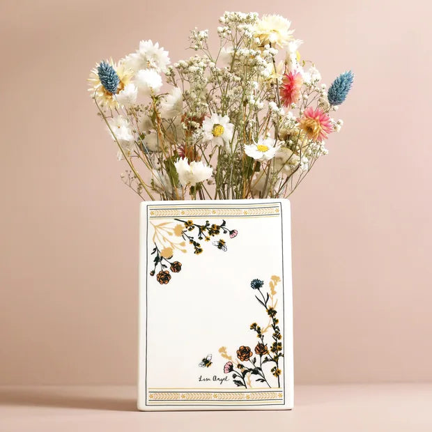 Back cover of floral book vase with dried flowers and Lisa Angel branding