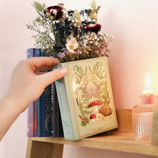 Woodland book vase styled on bookshelf with real books and candle