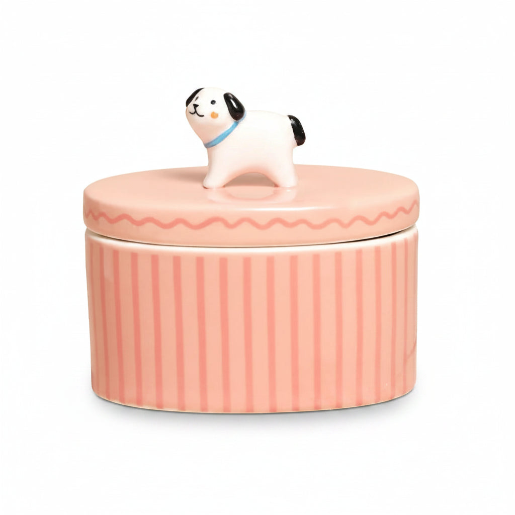 Pink striped ceramic trinket pot with a little dog sitting on the lid