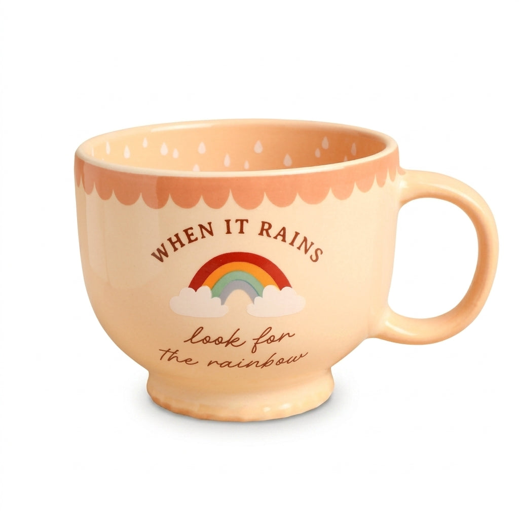 When It Rains rainbow ceramic mug on a white background