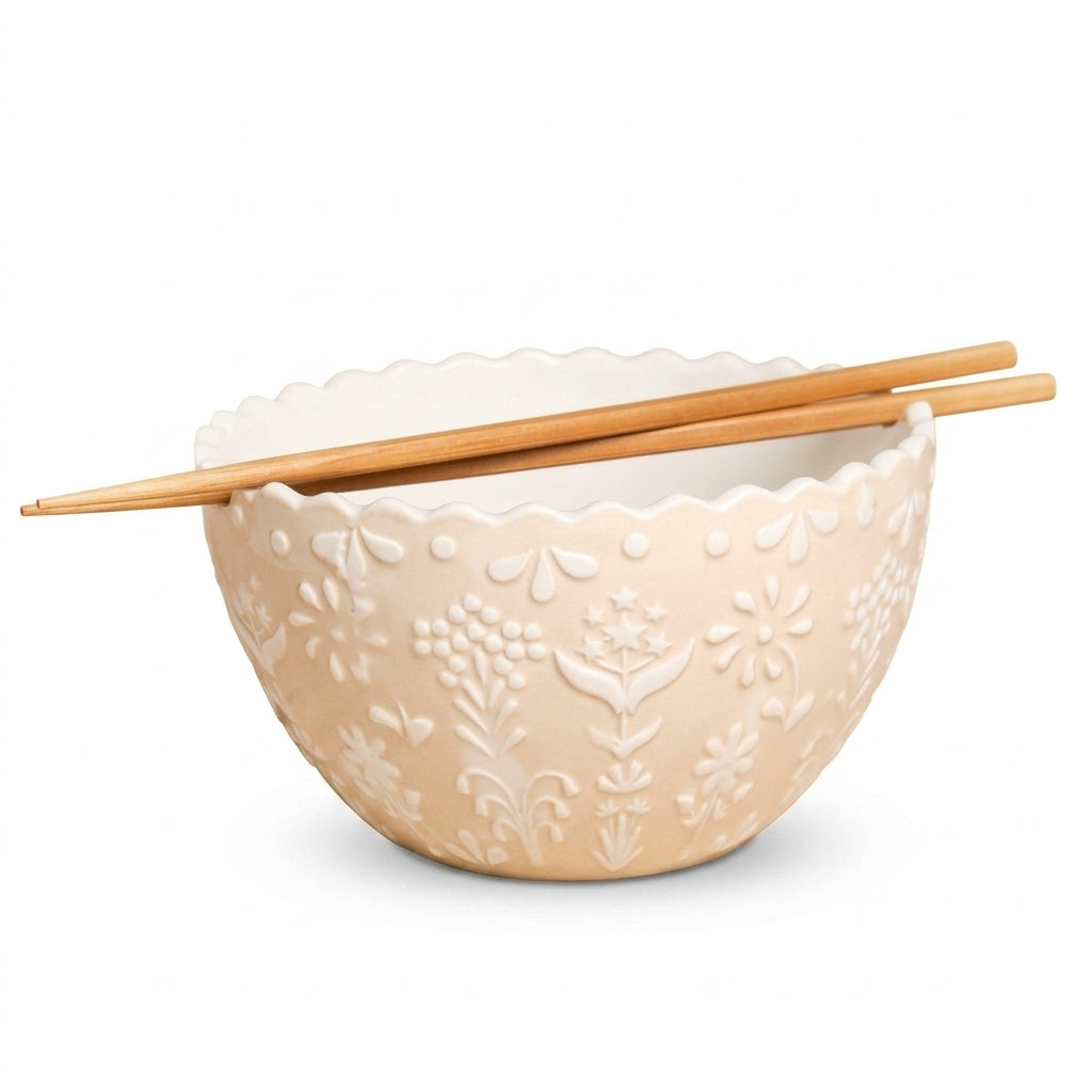 Ceramic ramen bowl and chopsticks set on a white background