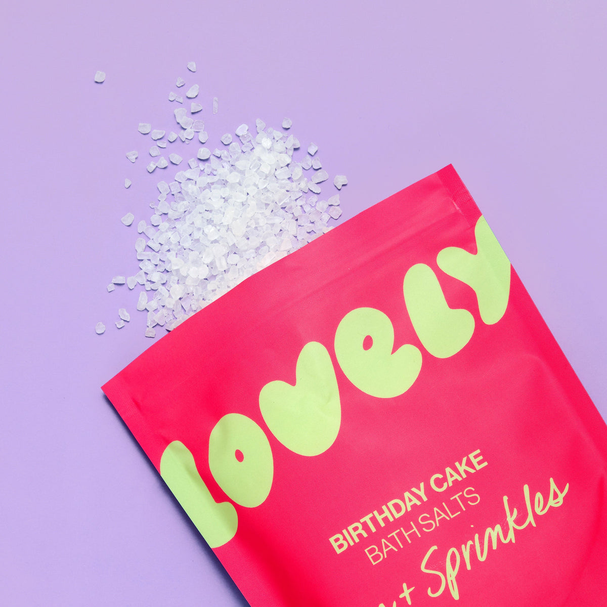 Birthday Cake bath salts spilling from the pouch