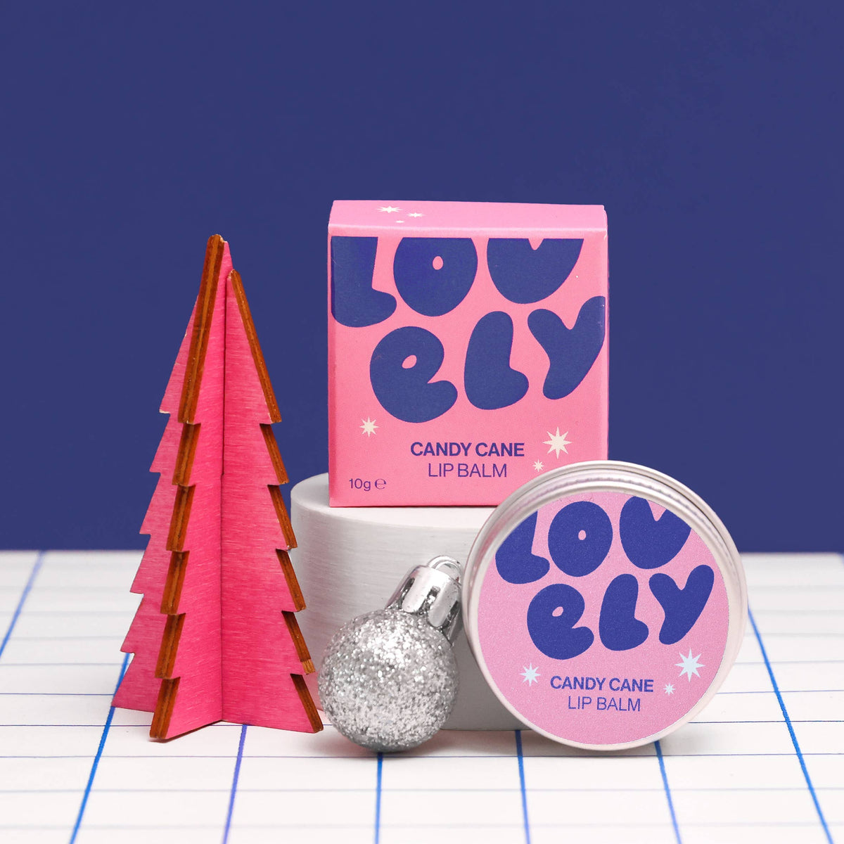 Candy Cane lip balm with a Christmas tree and bauble