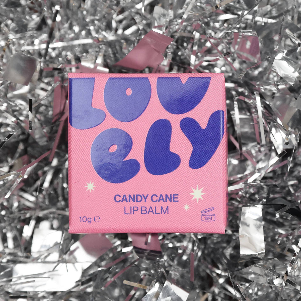 Candy Cane lip balm box on silver tinsel