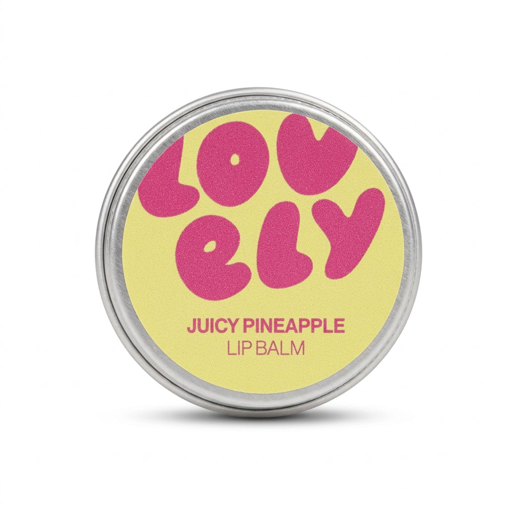 Hand holding the Juicy Pineapple lip balm tin