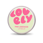 Hand holding the Pink Lemonade lip balm tin