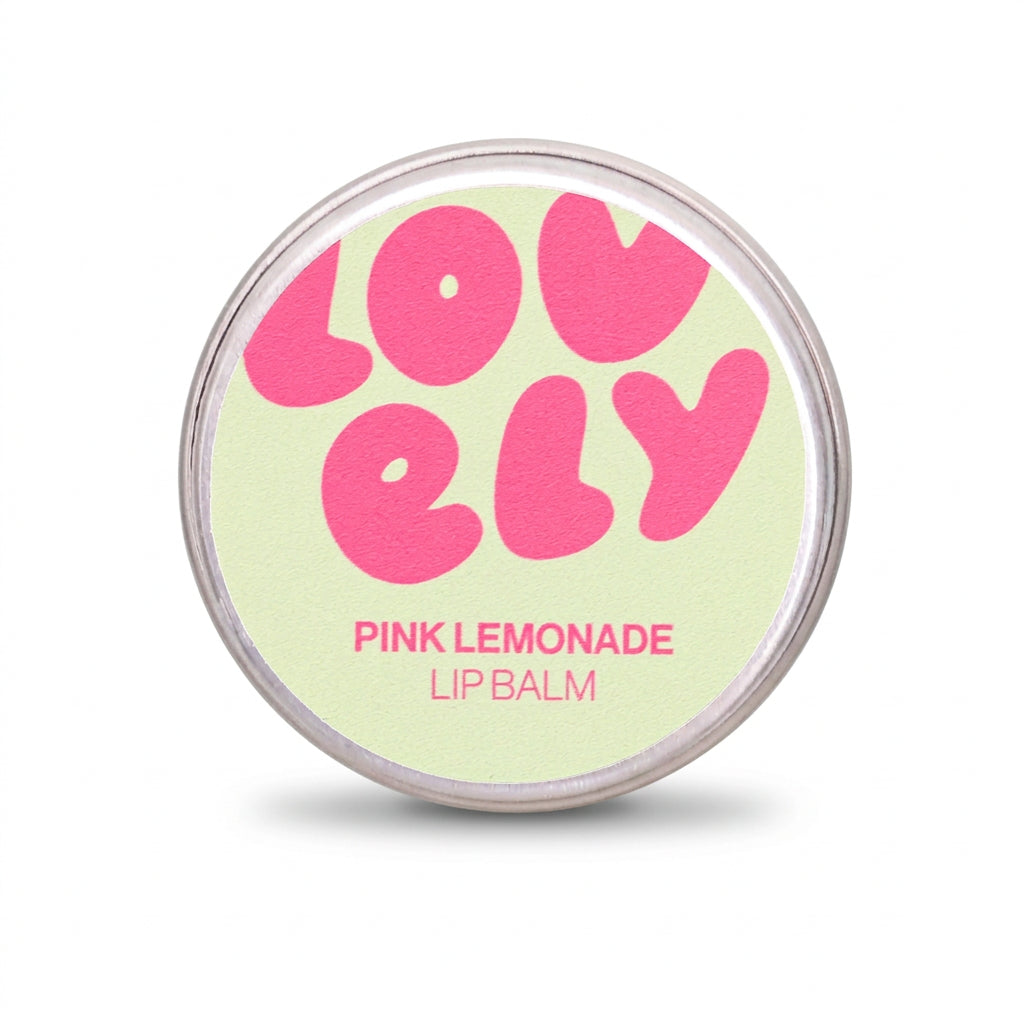 Hand holding the Pink Lemonade lip balm tin