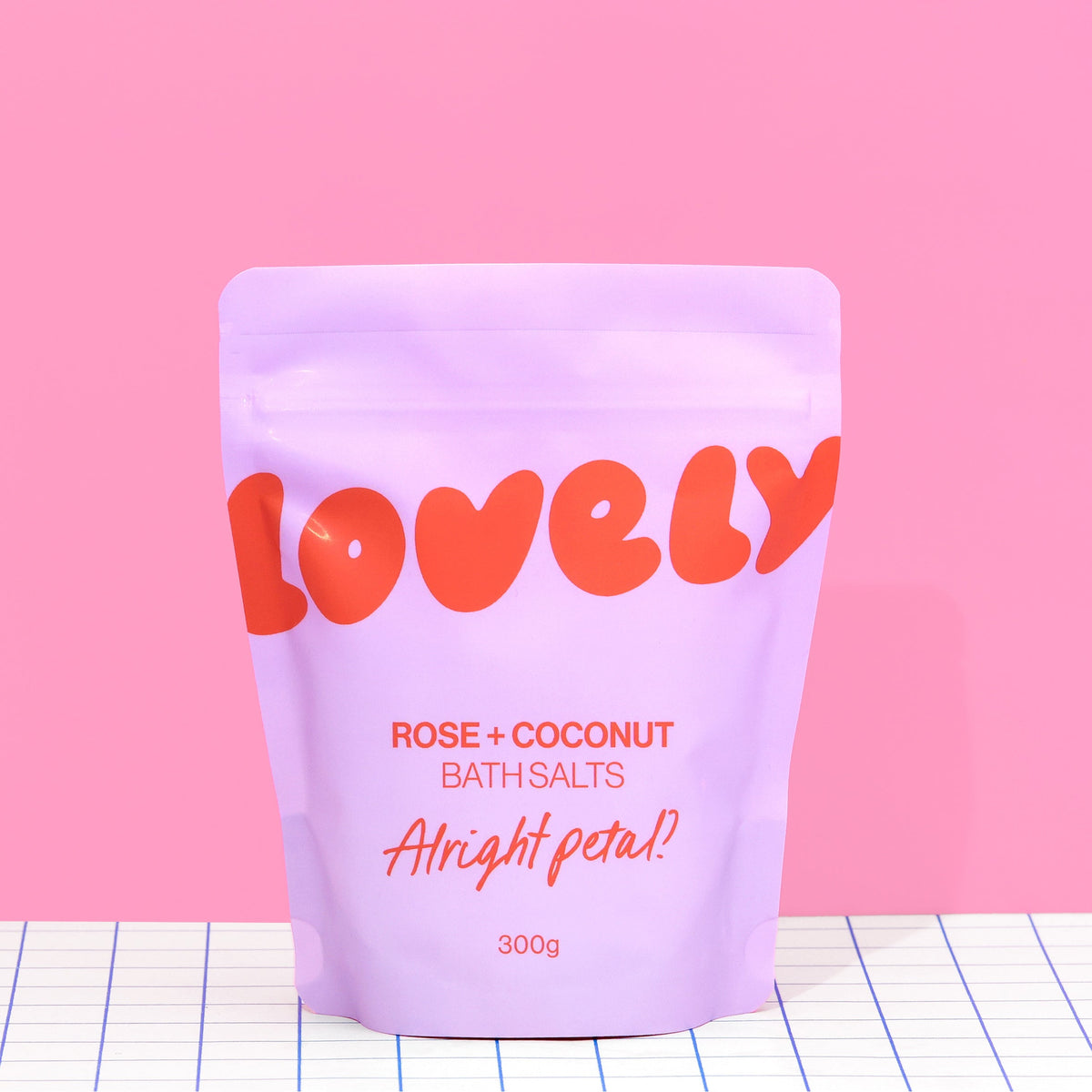 Rose and Coconut bath salts pouch by Lovely Skincare styled lifestyle view