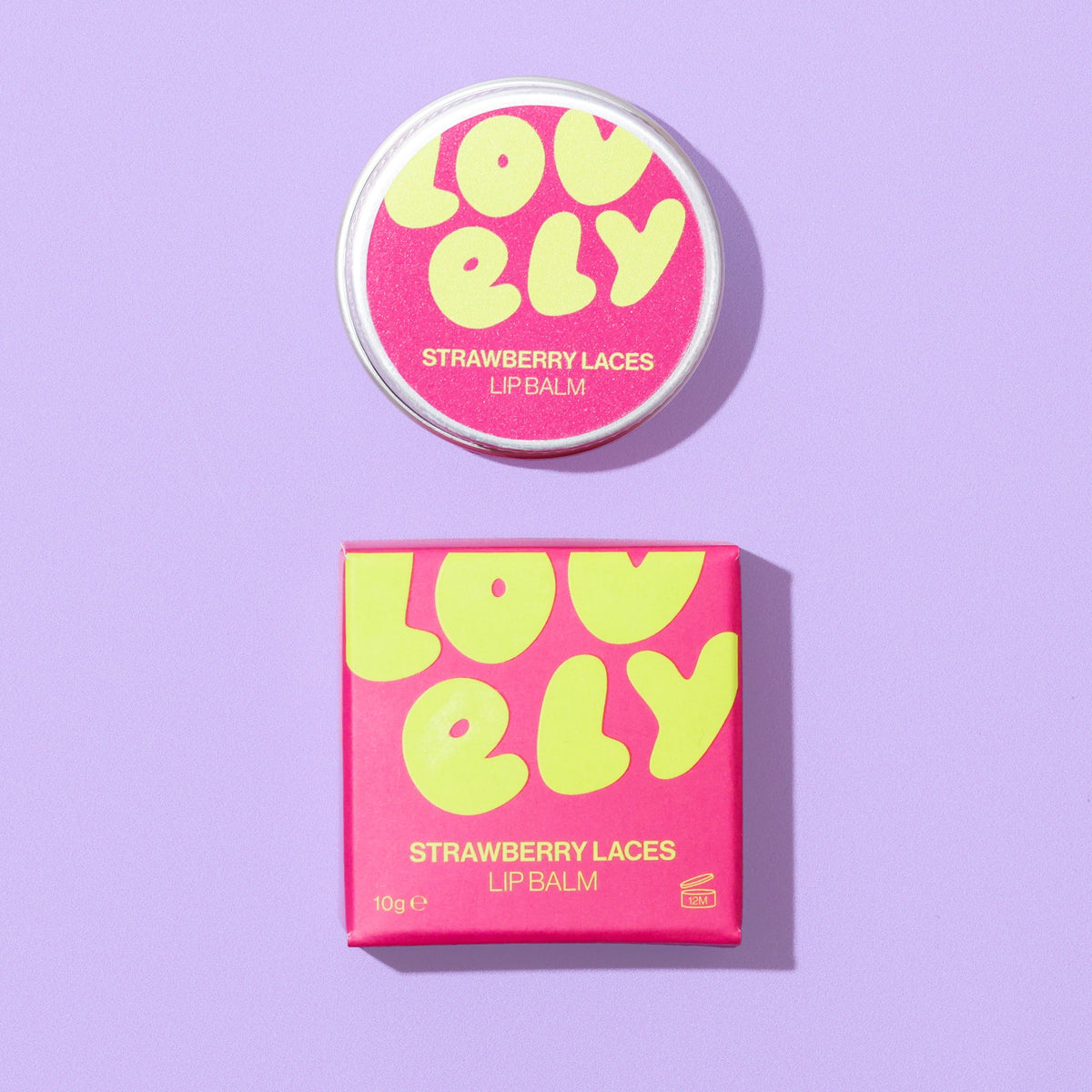 Strawberry Laces lip balm tin and box on a lilac background